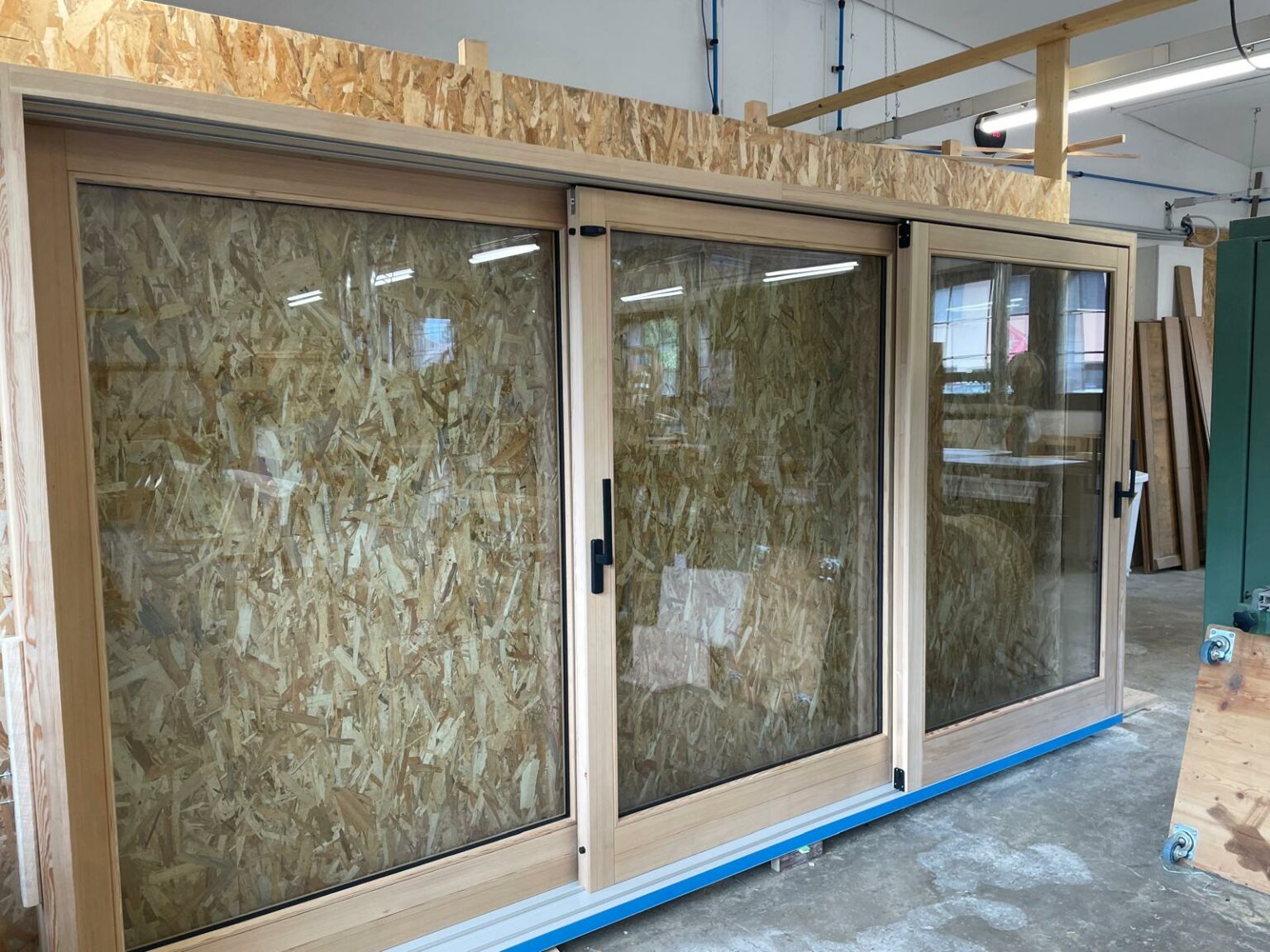 baie coulissante à levage 2 ouvrants vers 1 fixe